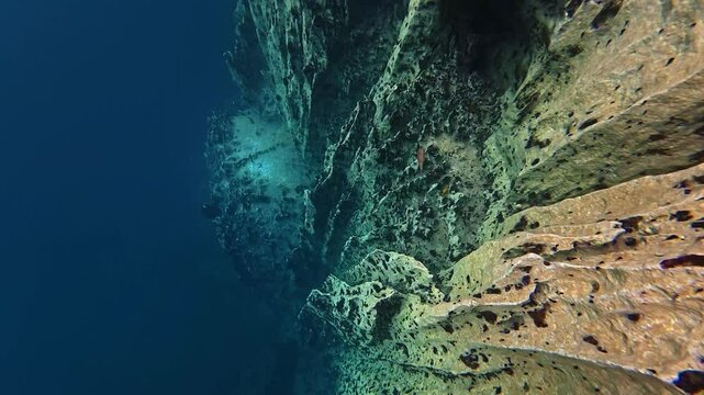 snorkeling Kayangan Lake limestone rocks in Philippines. tourism destination for snorkeling and scuba diving in Coron, Palawan. 