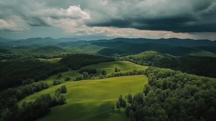 Fototapeta premium Dramatic Aerial View of Lush Green Appalachian Mountain Landscape with Storm Clouds.