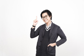 Smiling and pointing up for copy space advertising Of Handsome Asian Man Isolated On White Background