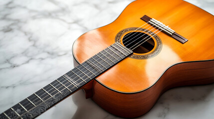Obraz premium An acoustic guitar rests on white marble, its wooden grain contrasting with the soft texture of the stone, evoking timeless elegance and musical beauty.