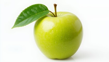 Close-up of a vibrant green apple with a single leaf.