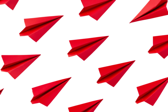 Red paper airplane is flying in the air, isolated