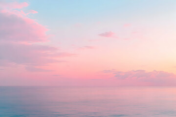 Naklejka premium Serene pastel sunset over calm ocean; dreamy pink and blue sky; tranquil seascape background.