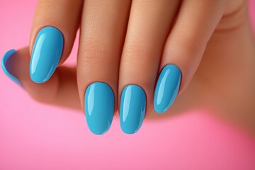 Close-up shot of female hand with bright blue nails. Perfect for beauty, fashion, and manicure websites.