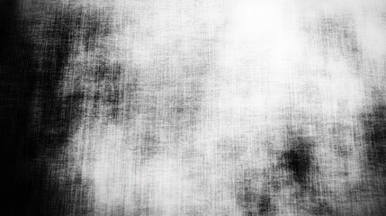 Abstract Black and White Texture Showing Grainy Fabric Background with Vignette Effect
