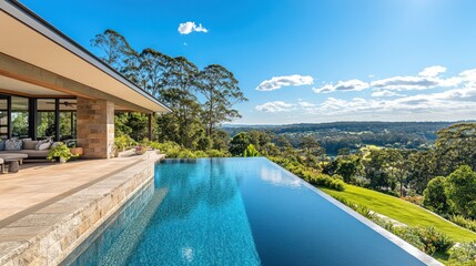 Fototapeta premium Infinity pool overlooking scenic valley.