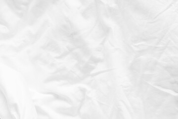 White bed sheet texture background, wrinkled duvet, crumpled satin blanket comforter cloth used in hotel, resort or home interior for bedding and sleep comfort