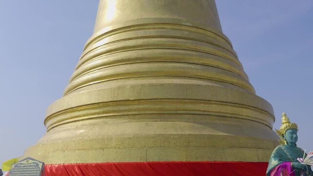 Stunning slow motion push in towards golden Pagoda of Wat Doi Saket in Bangkok