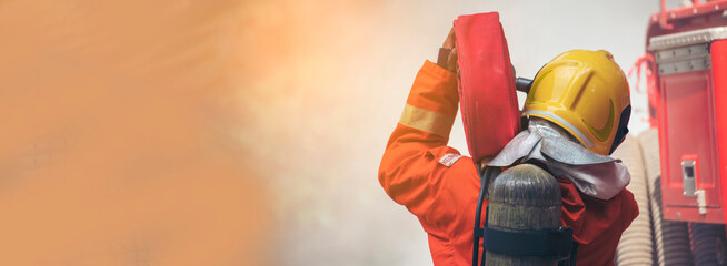 Banner Firefighter Rescue team training in fire fighting. Panorama Teamwork Firefighter fighting...