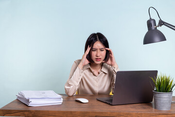 Tired, exhausted Asian woman with a laptop, problems with the project, feeling depressed, laziness...