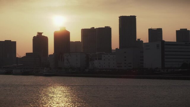 Sea,Sunset,Bayside,Sunlight,Buildings,Refrection