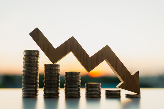 Down arrow with coin stack. Key concepts for success, methods, systems of raising or lowering Fed interest rates to correct inflation concepts.
