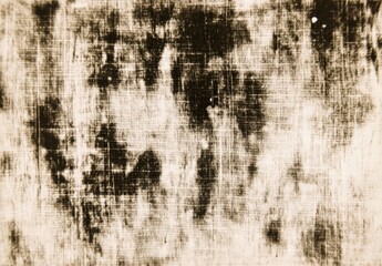 Obraz premium Abstract Texture Showing Dark Ink Blotches on a Textured Canvas Background