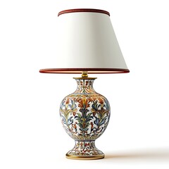 Elegant Table Lamp: An antique table lamp features a beautifully decorated ceramic base with floral patterns, and a white lampshade, sitting on a table