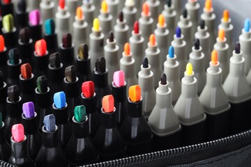 Many colorful markers in bag, closeup. Art supplies © New Africa