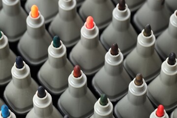 Many colorful markers as background, closeup. Art supplies © New Africa