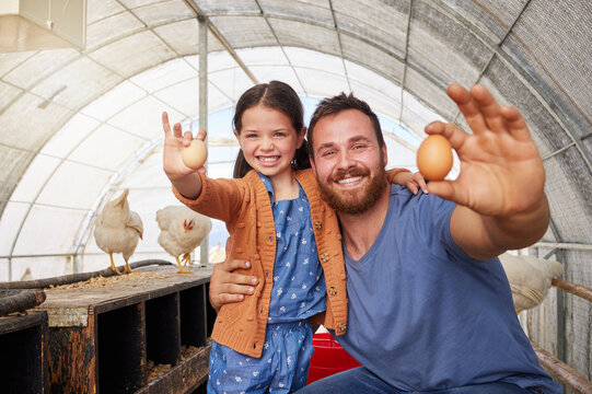Farm, eggs and portrait of dad with child for poultry production, agro business and sustainability. Agriculture, family and father with girl with free range chickens for protein and food industry