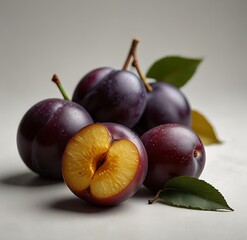 plums on white background