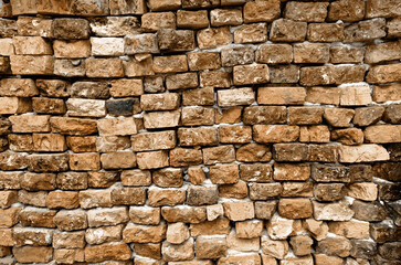Fototapeta premium Vintage brick wall texture old background. Urban and rough orange grunge block. Close up.
