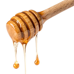 Honey dripping on wooden dripper isolated on transparent background