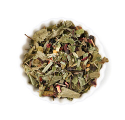 Dry herbal tea brew in bowl isolated on white, top view