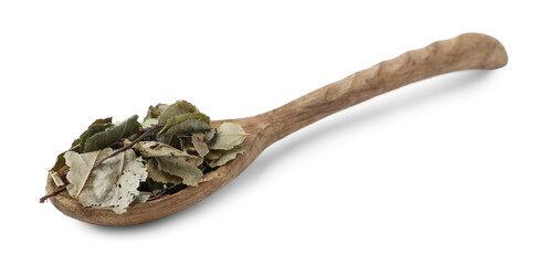 Dry herbal tea brew in spoon isolated on white