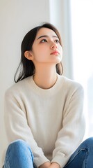 A person sitting in a comfortable position and lost in thought, Generative AI
