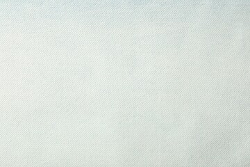 Texture of light jeans as background, closeup