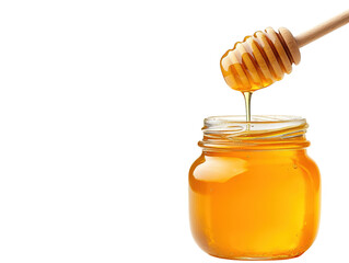 A jar of golden honey with a wooden dipper dripping honey into it.