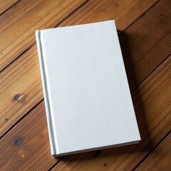 White Hardcover Book Mockup on m Wooden Table  HighQuality Design Illustration. A blank white book rests on a wooden surface.