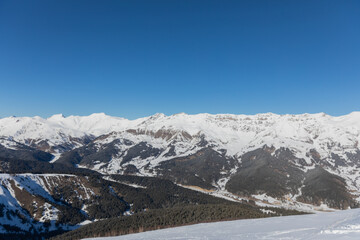 Beautiful landscape, snowy mountain peaks and blue sky