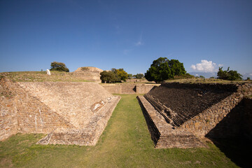 Mesoamerican ball court at the ancient archaeological ruins of Monte Alban in the Oaxaca region of Mexico. 