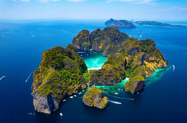 Concept touristic landmark of Thailand, travel photo by drone. Amazing aerial view of Ko Phi Phi Leh with Maya Bay in Andaman sea Krabi