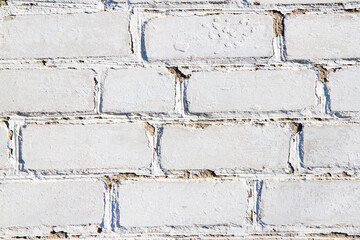 Old light brickwork close-up. Texture of a brick wall.