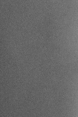 Wet and dry black fine grit sandpaper background backdrop. Do it youself decorating supplies concept