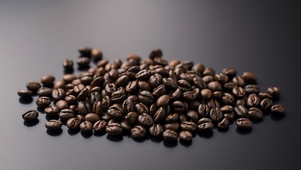 Fototapeta premium Premium Arabica Roasted Coffee Beans Close-Up on Black Background | Dark, Textured, Freshly Brewed Aesthetic