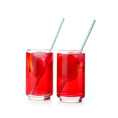 Glasses of tasty blood orange lemonade isolated on white background
