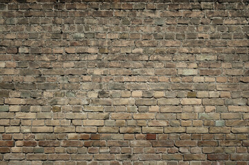 brick wall made of old brown bricks close up