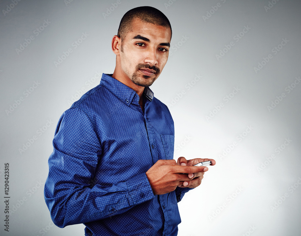 Poster studio, businessman and portrait with smartphone for chat, text communication and typing for contact