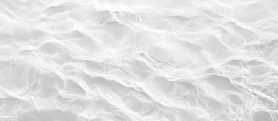 Obraz premium White water texture, a clear, transparent, and calm surface with ripples and waves against a light gray background. Minimalist flat lay banner for a spa or beauty concept