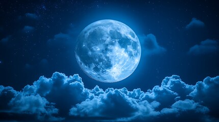 Obraz premium A beautiful large blue moon shines over the puffy clouds at night