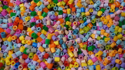 Plastic beads in a box