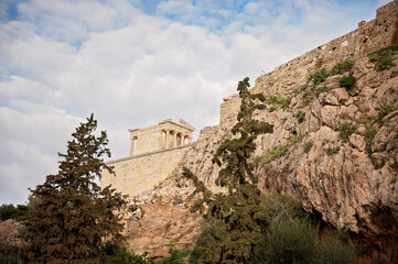 Fototapeta premium emple of Athena Nike atop rocky Acropolis hill in Athens, Greece