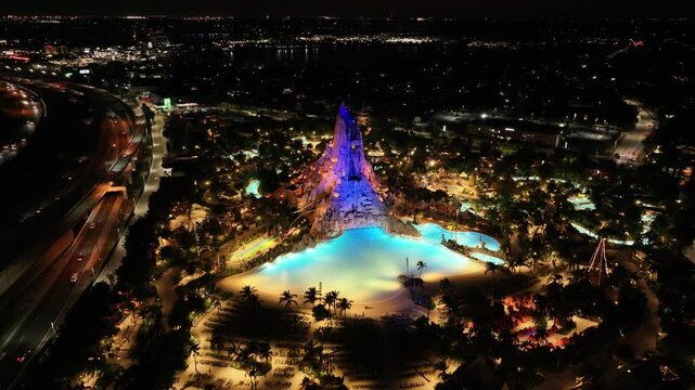 Volcano Bay At Orlando In Florida United States. Illuminated Park. Attraction Scene. Night City Scenery. Florida United States. Volcano Bay At Orlando In Florida United States.