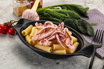 Italian cuisine - pasta tortiglioni with squid