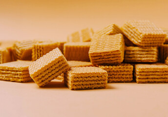 Crunchy wafers stacked on a warm background creating a cozy vibe