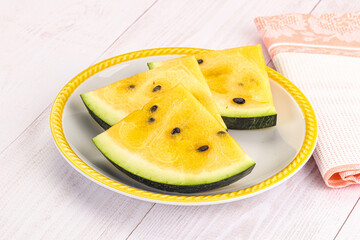 Sweet and juicy yellow watermelon slices