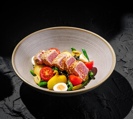 Delicious seared tuna salad served in a modern bowl