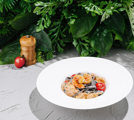 Delicious seafood pasta served with fresh ingredients on a table