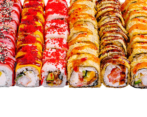 Colorful selection of sushi rolls on a white background